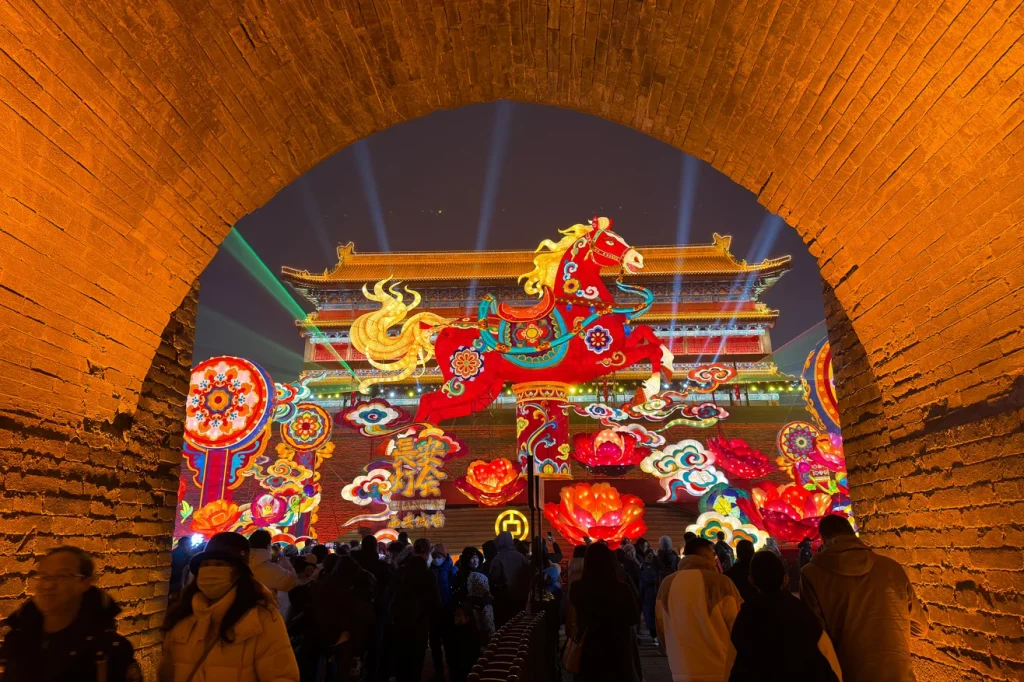 People view colorful displays at the 2026 Xi'an City Wall Lantern Festival on January 2, 2026 in Xi'an, China. VCG/Getty Images
