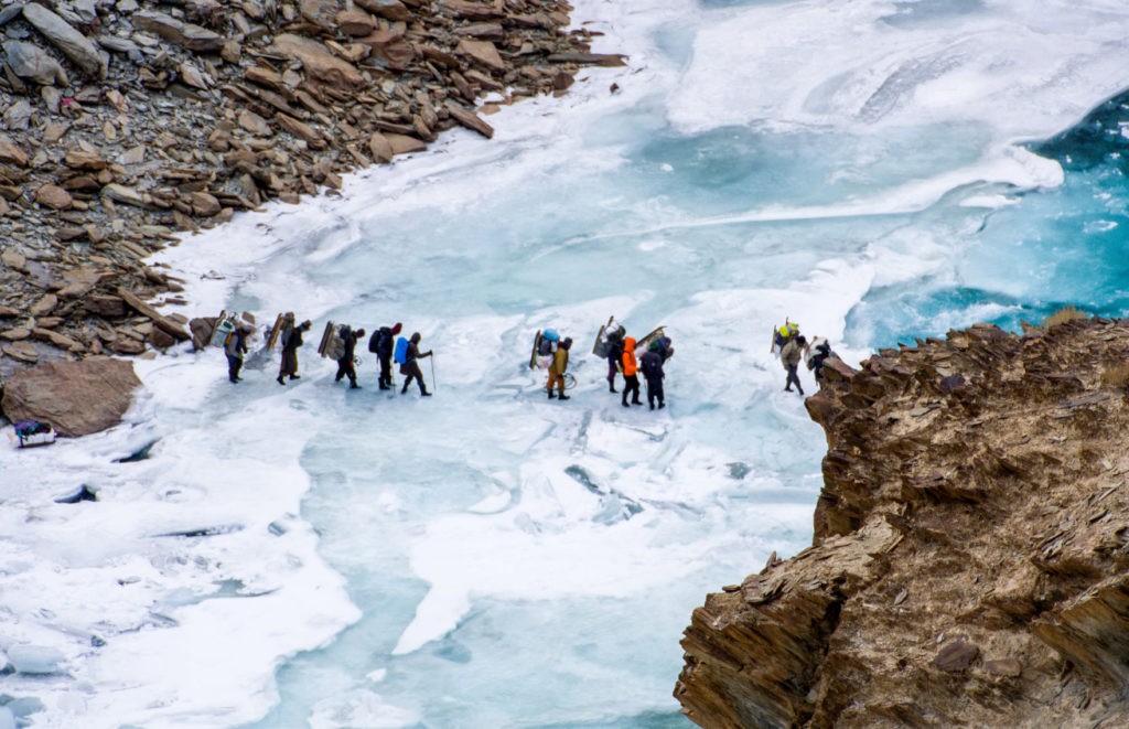 People Crossing Frozen Zanskar River. Chadar Trek