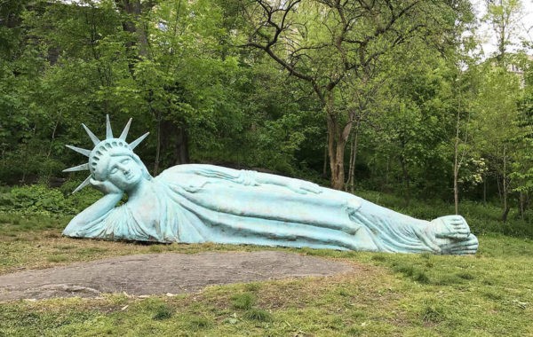 News at 9: Reclining Liberty moved from Harlem to Jersey City, World's largest treehouse and more