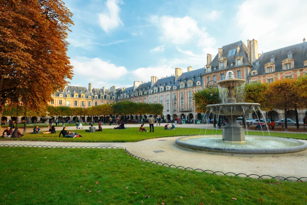 People spending time in garden of Palais Royal in Paris, FranceGetty Images